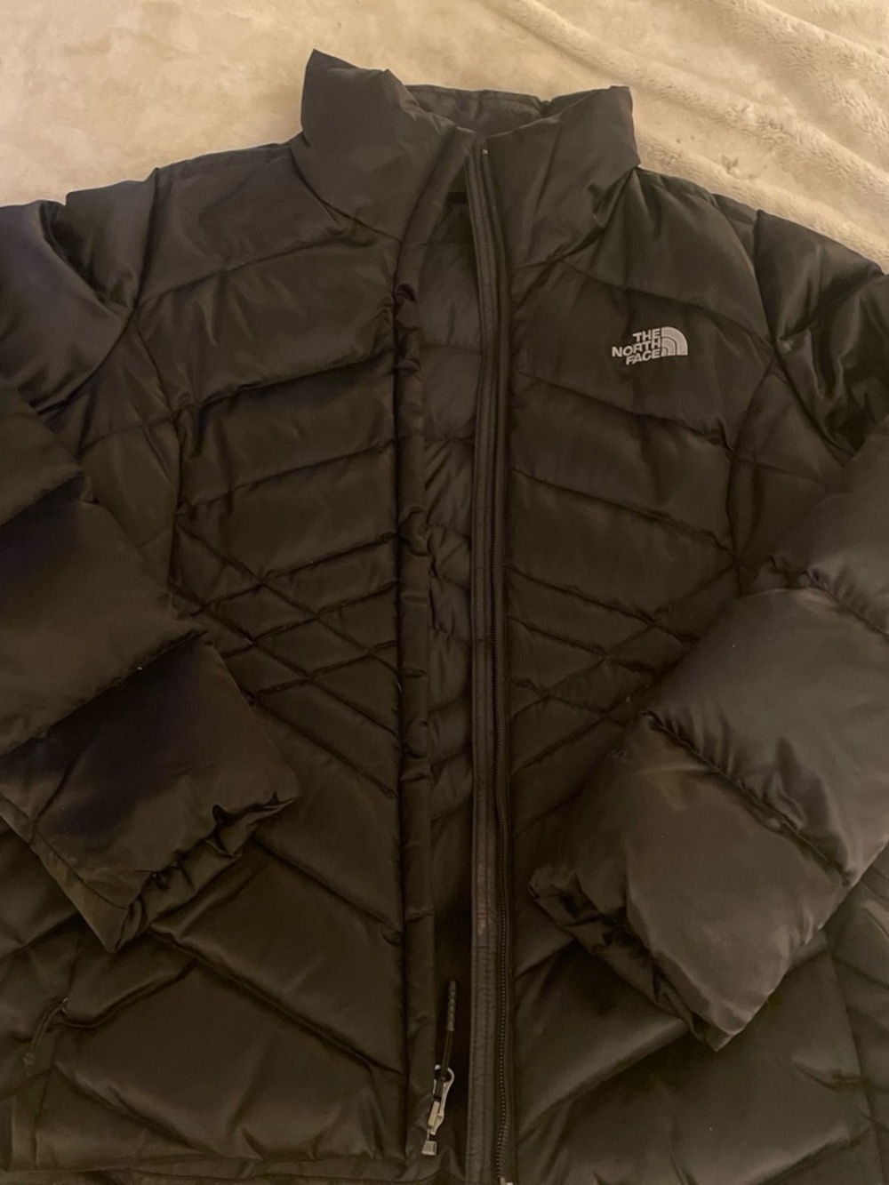 The North Face Black Women's Jacket with Light Blue Accent